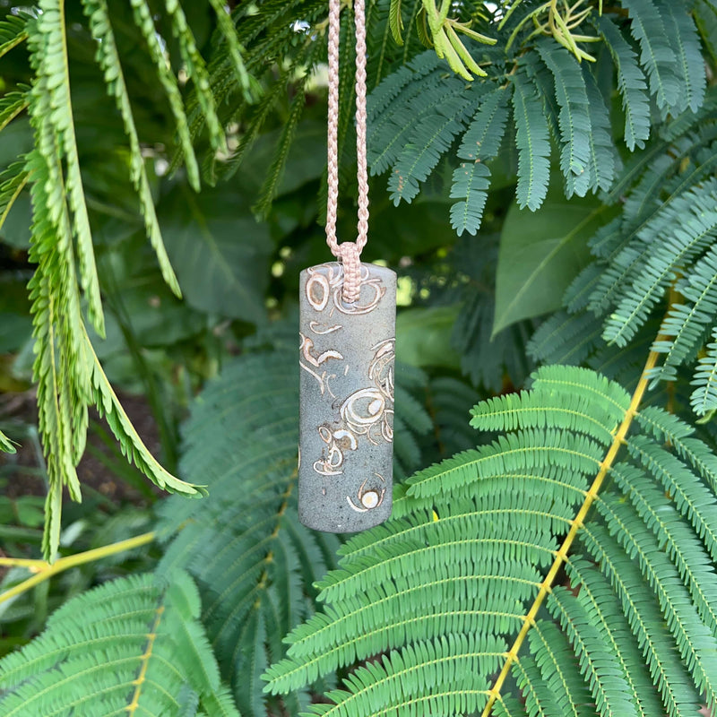 Fossilised Shell Toki Pendant "Sea Creatures"